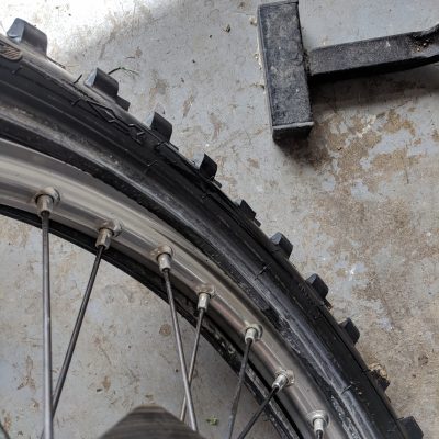 Push wheel down into tire