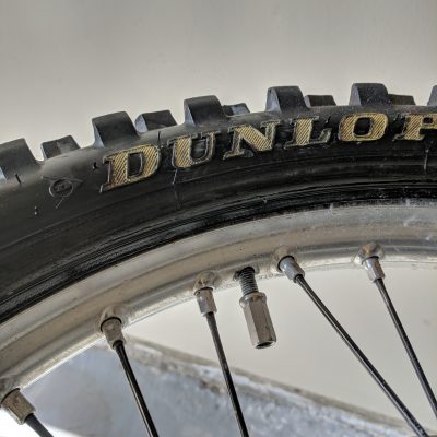 Rim lock nut mounted tire