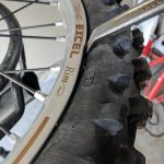 Tire iron on tire bead